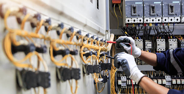 Professional Electrician technician working in Enosburg Falls, VT